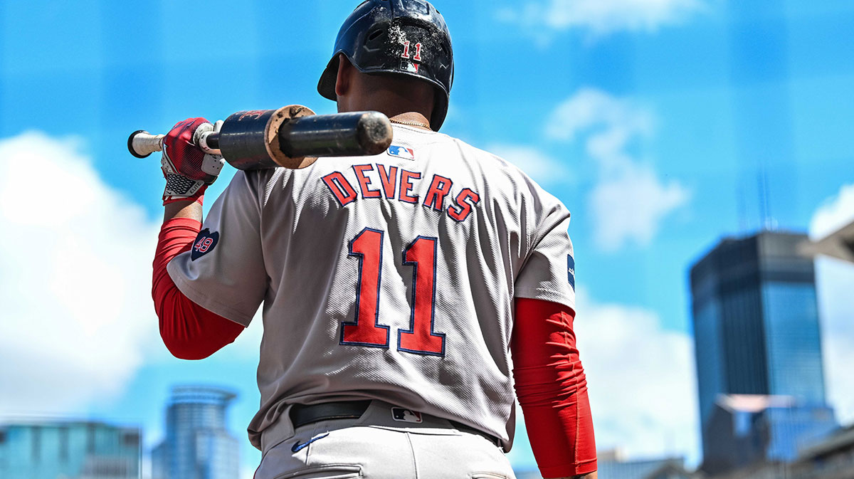 May 4, 2024; Minneapolis, Minnesota, USA; Boston Red Sox third baseman Rafael Devers (11) looks on from the on deck circle during the game against the Minnesota Twins at Target Field. Mandatory Credit: Jeffrey Becker-Imagn Images