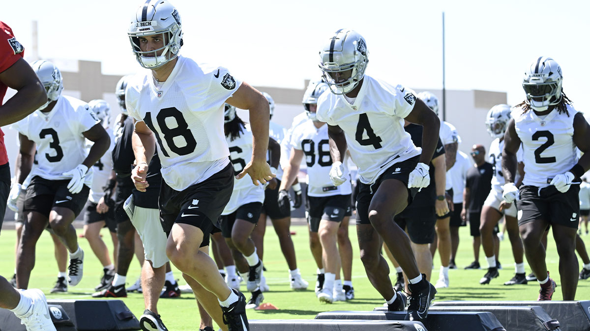 Las Vegas Raiders wide receiver Jack Bech (18) and wide receiver Shedrick Jackson (4) perform a drill during Las Vegas Raiders Minicamp at Intermountain Health Performance Center.