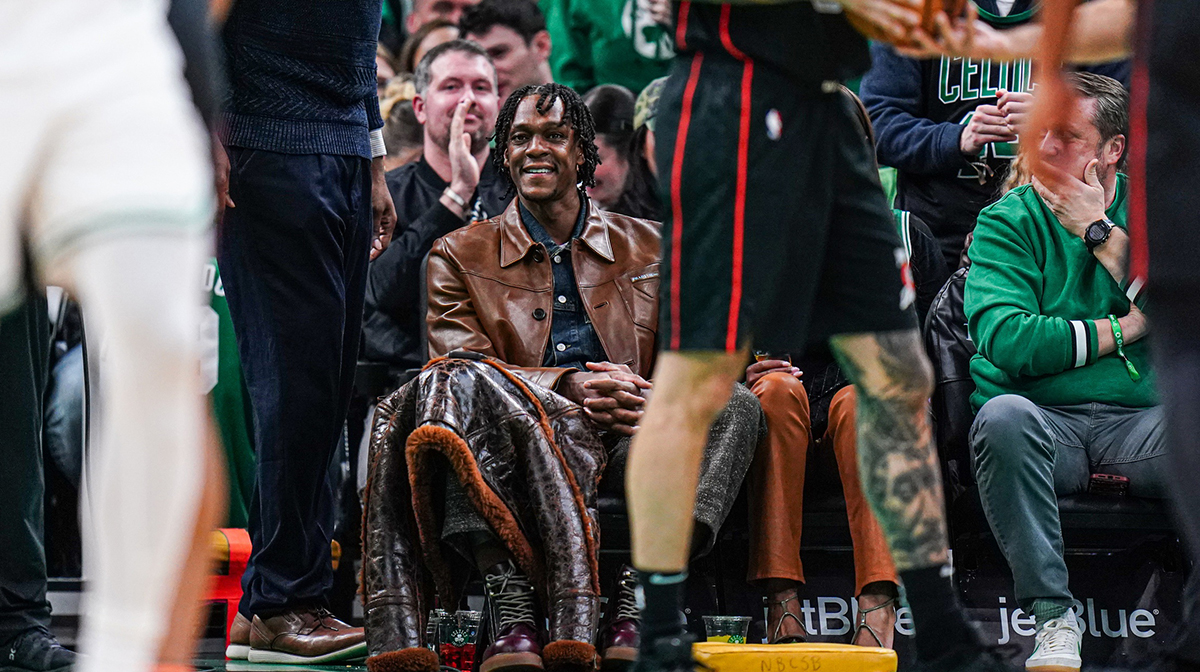 Former Boston Celtics player Rajon Rondo on the sideline as the Celtics take on the Detroit Pistons in the second half at TD Garden.