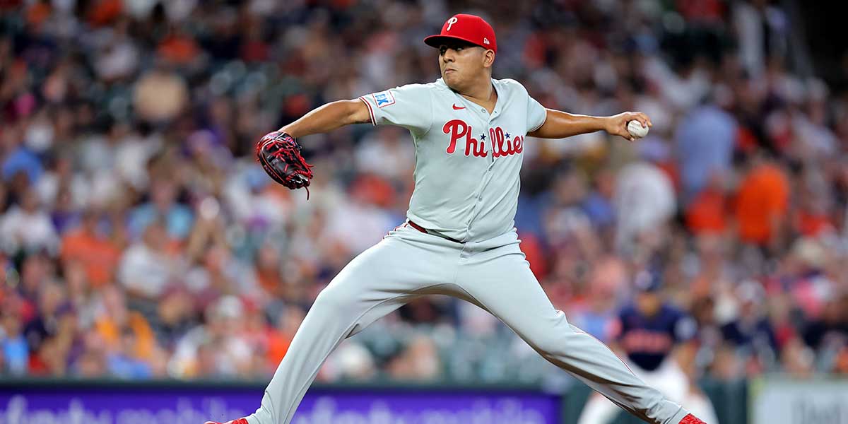 Philadelphia Phillies starting pitcher Ranger Suarez (55) delivers a pitch against the Houston Astros during the first inning at Daikin Park.