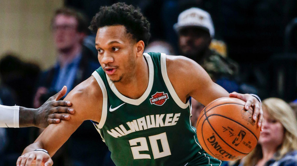 Milwaukee Bucks guard Rashad Vaughn (20) dribbles the ball against the Minnesota Timberwolves in the fourth quarter at Target Center.