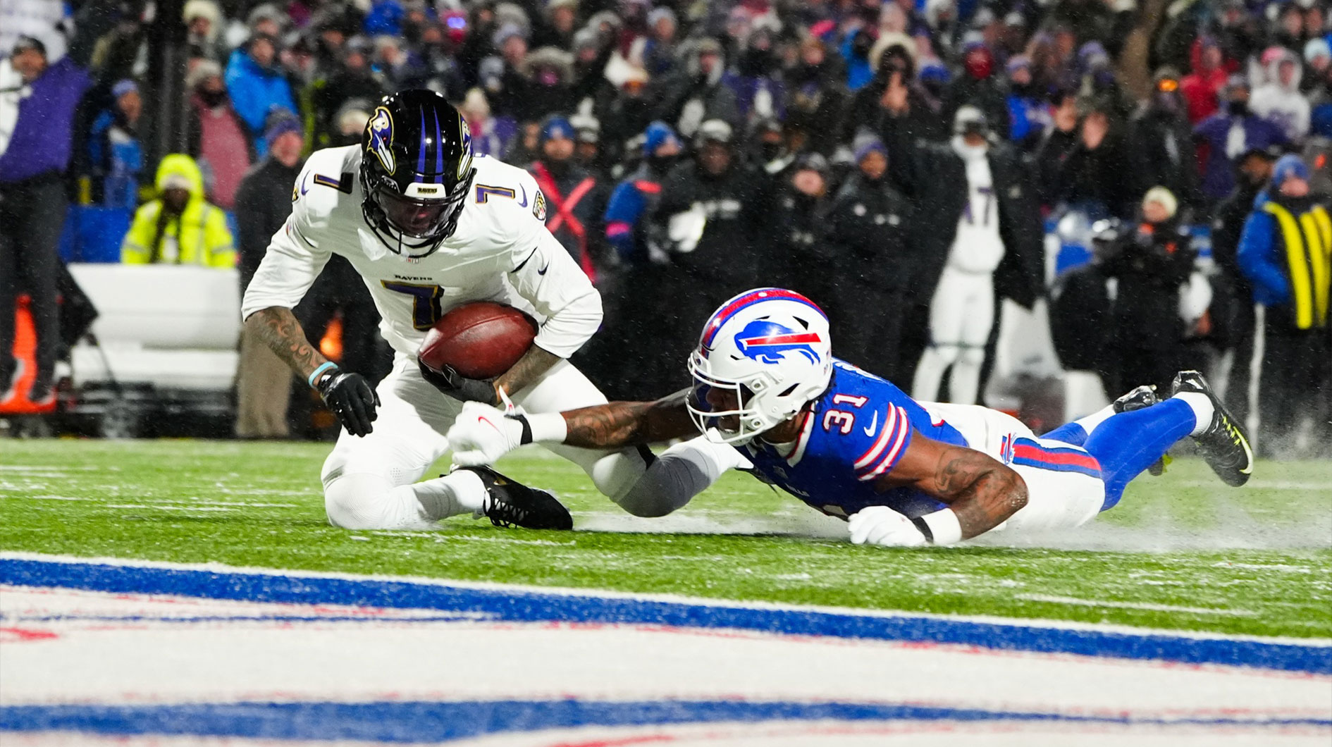 Baltimore Ravens wide receiver Rashod Bateman (7) makes a catch against Buffalo Bills cornerback Rasul Douglas (31) during the second quarter in a 2025 AFC divisional round game at Highmark Stadium.