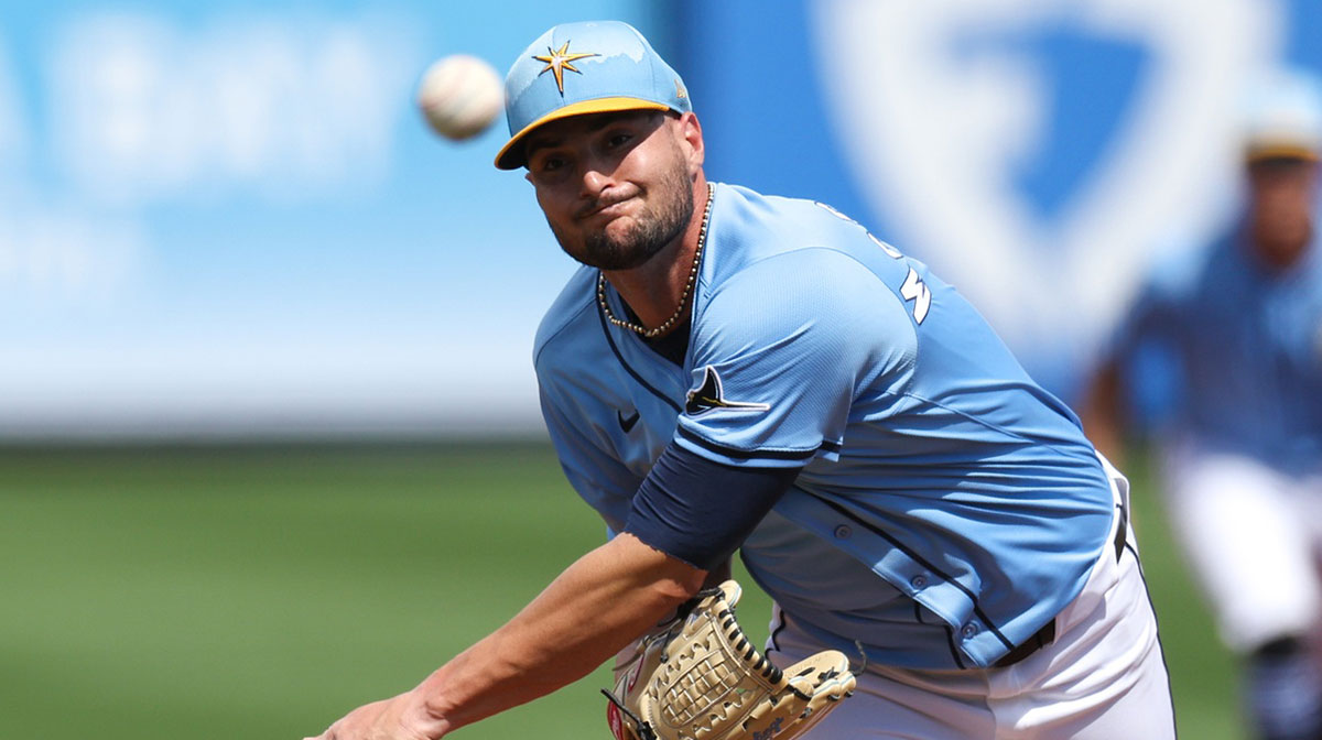 Tampa Bay Rays pitcher Shane McClanahan (18) throws a pitch against the New York Mets in the second inning during spring training at Charlotte Sports Park.