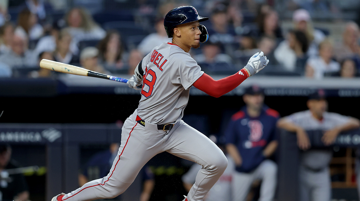 Boston Red Sox second baseman Kristian Campbell (28) follows through on an RBI single against the New York Yankees during the third inning at Yankee Stadium.