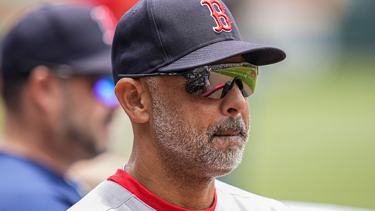 Boston Red Sox manager Alex Cora (13) shown in the dugout before the game against the Atlanta Braves at Truist Park.