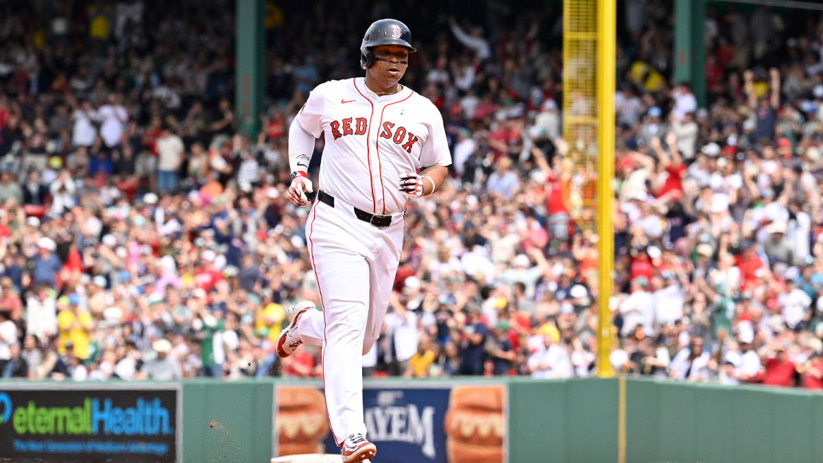 Boston Red Sox designated hitter Rafael Devers (11) runs the bases after hitting a one run home run against the New York Yankees during the fifth inning at Fenway Park. Devers was traded to Giants later that day.