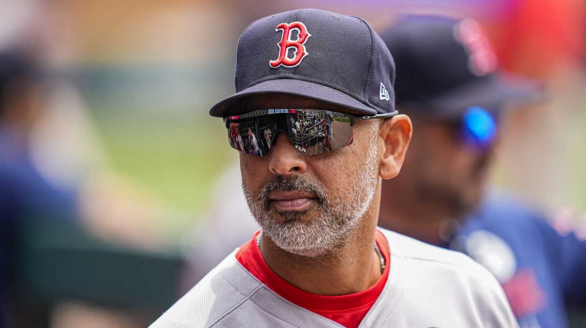 Boston Red Sox manager Alex Cora (13) shown in the dugout before the game against the Atlanta Braves at Truist Park.