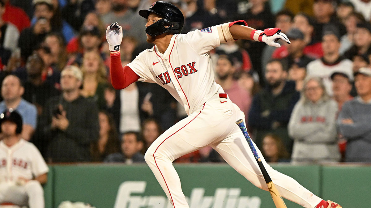 Boston Red Sox second baseman Kristian Campbell (28) hits a RBI against the Tampa Bay Rays during the ninth inning at Fenway Park.