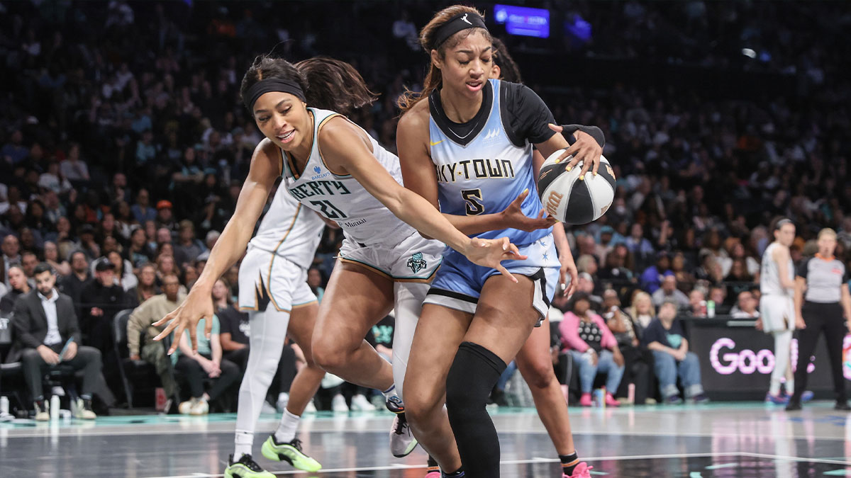 New York Liberty forward Isabelle Harrison (21) and Chicago Sky forward Angel Reese (5) fight for a loose ball in the second quarter at Barclays Center.