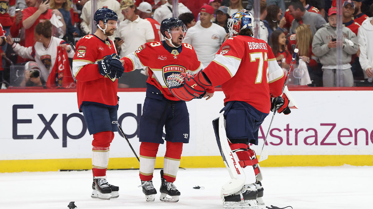 Florida Panthers goaltender Sergei Bobrovsky (72), Florida Panthers center Brad Marchand (63) and Florida Panthers center Sam Reinhart (13) celebrate after they beat the Toronto Maple Leafs in game four of the second round of the 2025 Stanley Cup Playoffs at Amerant Bank Arena.