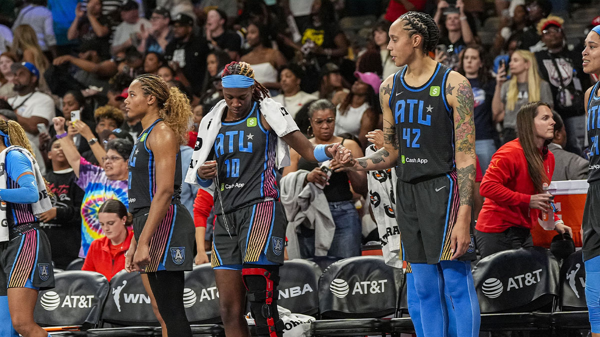 Atlanta Dream guard Rhyne Howard (10) and center Brittney Griner (42) react after defeating the Chicago Sky at Gateway Center Arena at College Park.