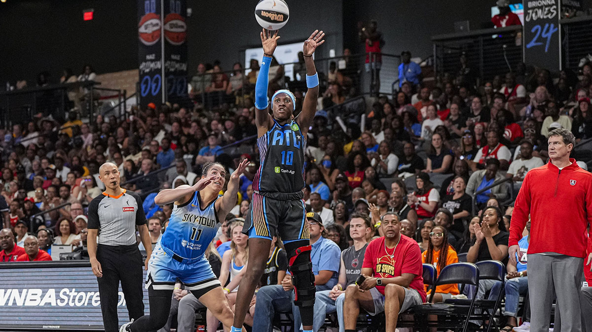 Atlanta Dream guard Rhyne Howard (10) shoots behind Chicago Sky guard Kia Nurse (11) during the second half at Gateway Center Arena at College Park.