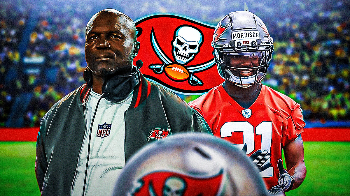 Tampa Bay Buccaneers head coach Todd Bowles with CB Benjamin Morrison. There is also a logo for the Tampa Bay Buccaneers.