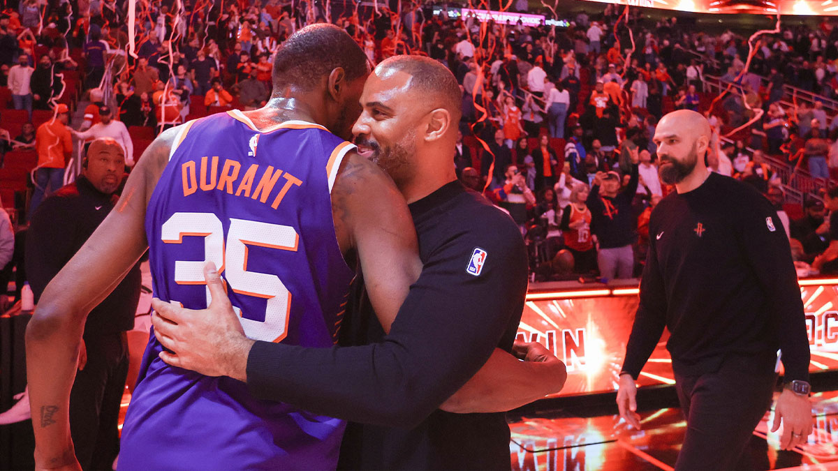 Phoenix Suns forward Kevin Durant (35) hugs Houston Rockets head coach Ime Udoka after a game at Toyota Center.