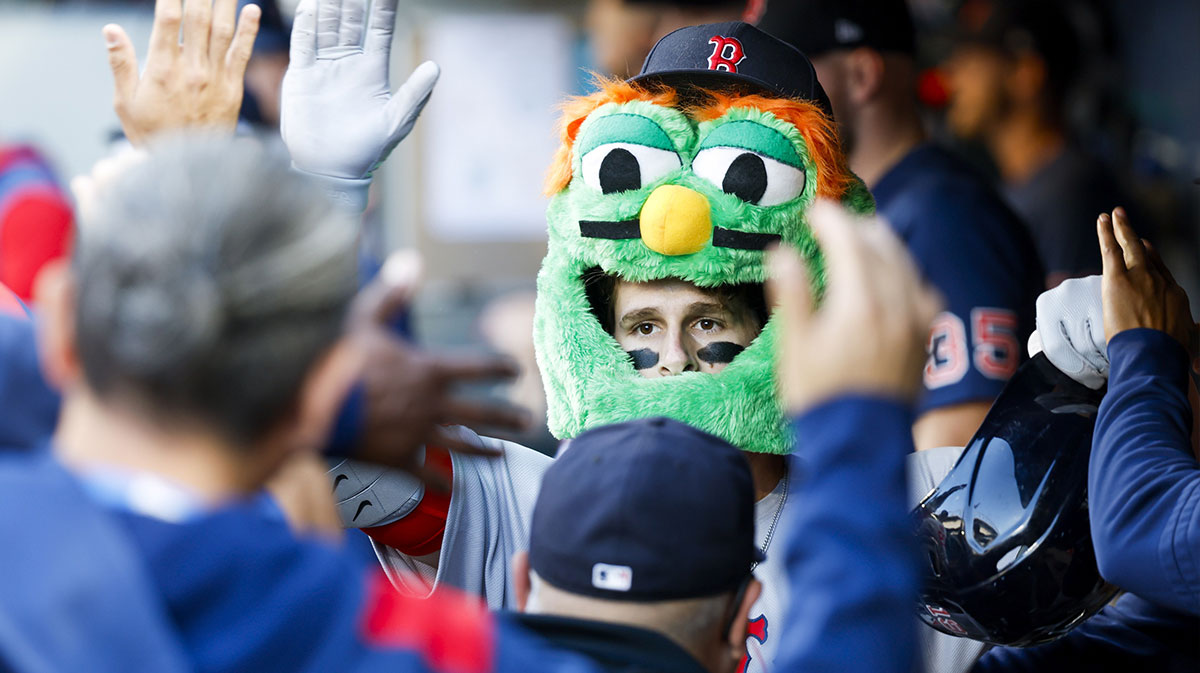 Boston Red Sox right fielder Roman Anthony (19) celebrates in the dugout after hitting a solo-home run against the Seattle Mariners during the first inning at T-Mobile Park.