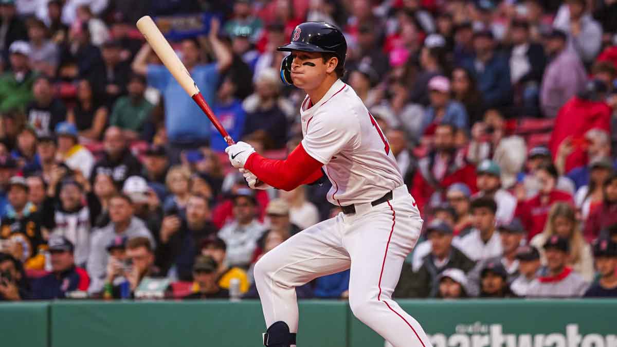 Boston Red Sox outfielder Roman Anthony (19) hits a double to drive in two runs against the Tampa Bay Rays in the first inning at Fenway Park.