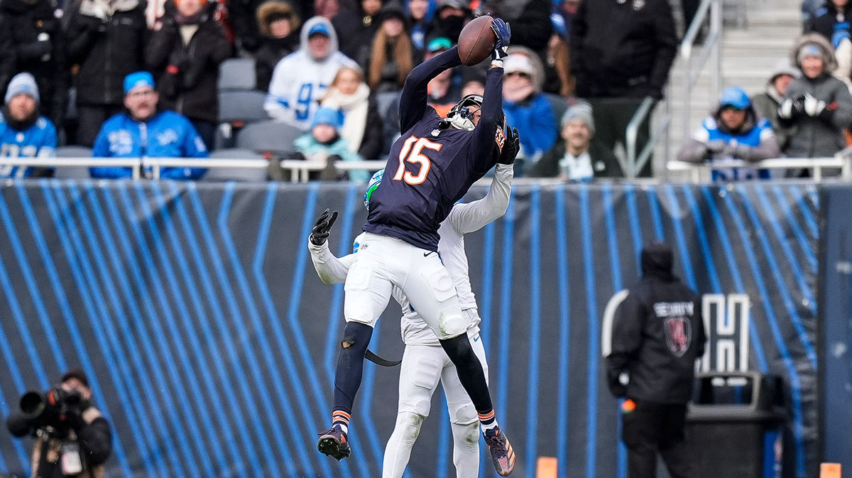 Chicago Bears wide receiver Rome Odunze (15) makes a catch against Detroit Lions cornerback Amik Robertson (21) during the second half at Soldier Field in Chicago, Ill. on Sunday, Dec. 22, 2024.