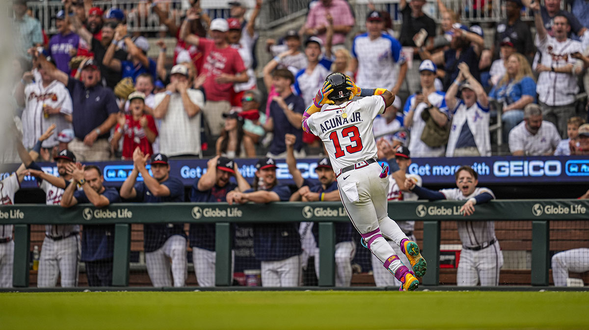 Jun 18, 2025; Cumberland, Georgia, USA; Atlanta Braves right fielder Ronald Acuna Jr (13) reacts after hitting a lead off home run against the New York Mets during the first inning at Truist Park. Mandatory Credit: Dale Zanine-Imagn Images