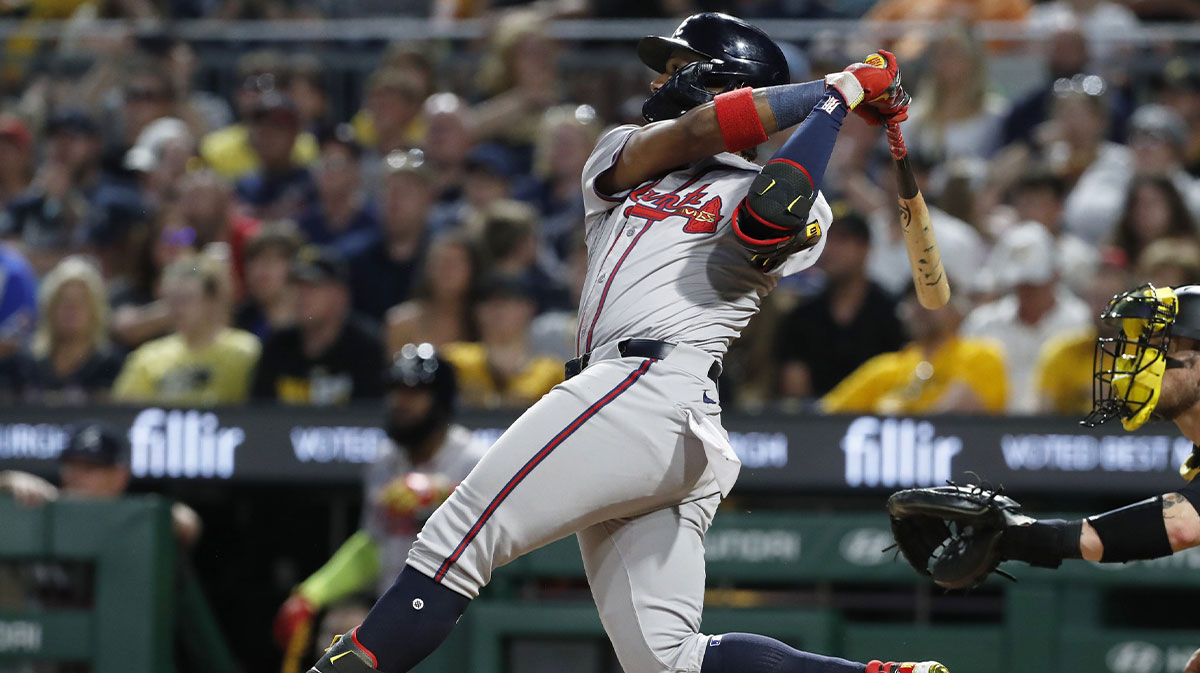 May 24, 2024; Pittsburgh, Pennsylvania, USA; Atlanta Braves right fielder Ronald Acuna Jr. (13) hits a three-run home run against the Pittsburgh Pirates during the eighth inning at PNC Park.