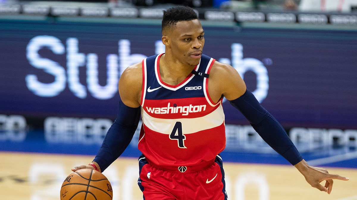 Washington Wizards guard Russell Westbrook (4) dribbles the ball against the Philadelphia 76ers during the first quarter at Wells Fargo Center.