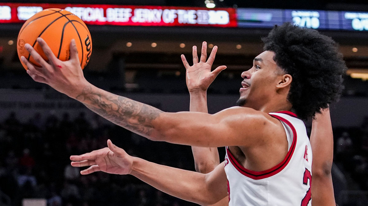 Rutgers Scarlet Knights guard Dylan Harper (2) goes up for a basket Wednesday, March 12, 2025, in a first round game at the 2025 TIAA Big Ten Men’s Basketball Tournament between the USC Trojans and the Rutgers Scarlet Knights at Gainbridge Fieldhouse in Indianapolis. The USC Trojans defeated the Rutgers Scarlet Knights, 97-89.