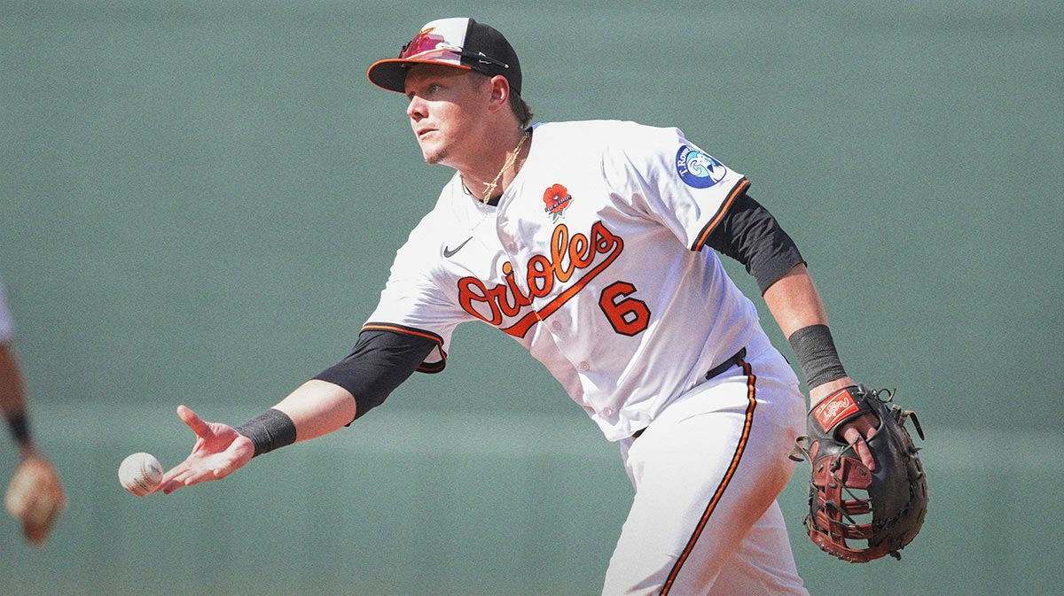 Baltimore Orioles first baseman Ryan Mountcastle (6) tosses the ball to Baltimore Orioles pitcher Seranthony Dominguez (56) (not pictured) to record an out against the St. Louis Cardinals during the seventh inning.