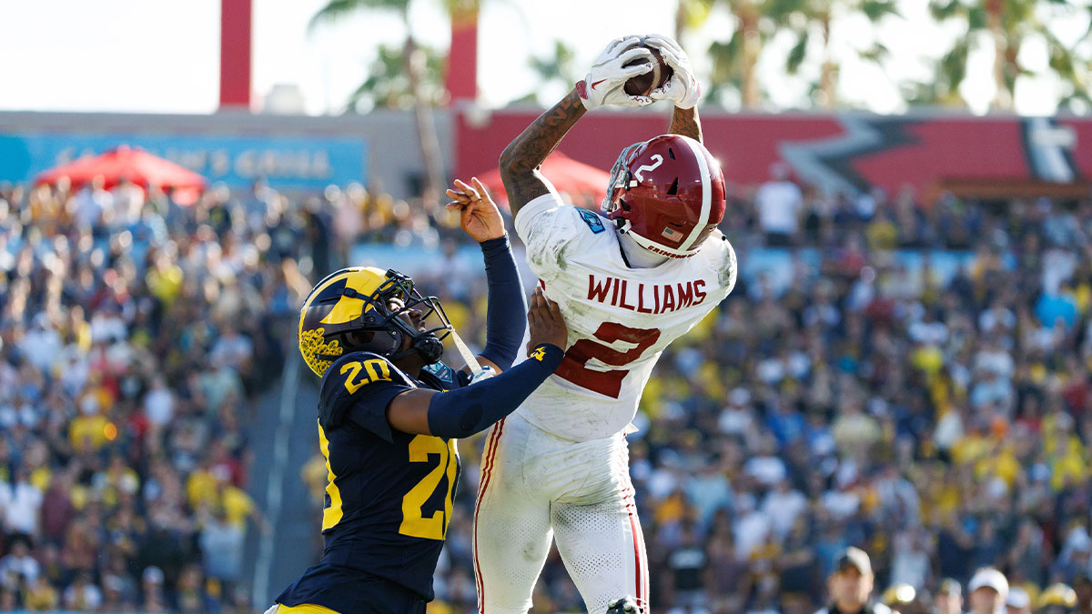 Alabama Crimson Tide wide receiver Ryan Williams (2) makes a catch while Michigan Wolverines defensive back Jyaire Hill (20) pushes him out of bounds during the second half at Raymond James Stadium.
