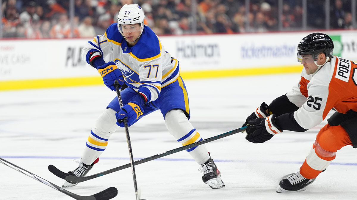 Buffalo Sabres right wing JJ Peterka (77) controls the puck against Philadelphia Flyers center Ryan Poehling (25) in the third period at Wells Fargo Center.