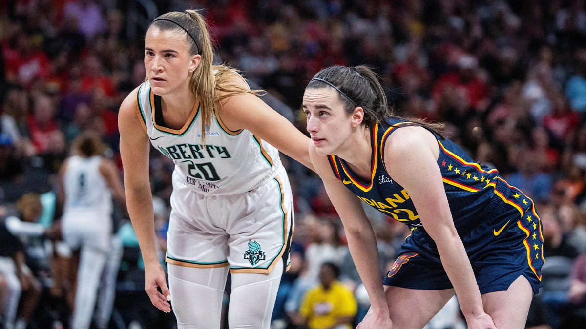 New York Liberty guard Sabrina Ionescu (20) and Indiana Fever guard Caitlin Clark (22) in the second half at Gainbridge Fieldhouse.