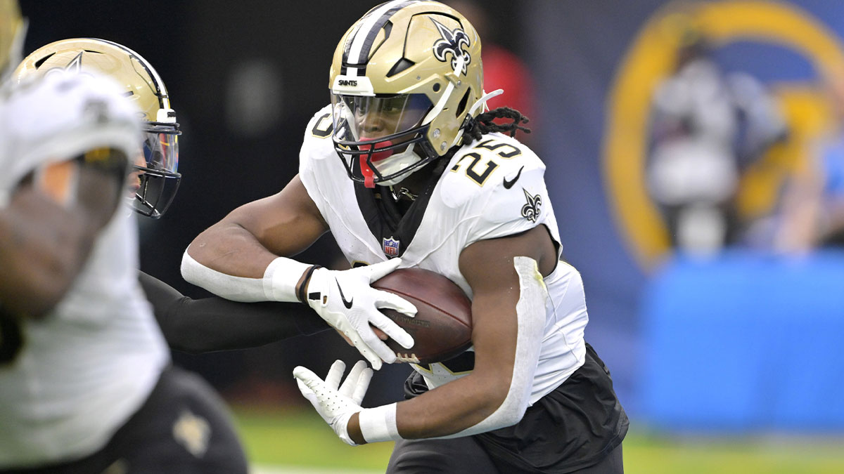 New Orleans Saints running back Kendre Miller (25) carries the ball in the second half against the Los Angeles Chargers at SoFi Stadium.