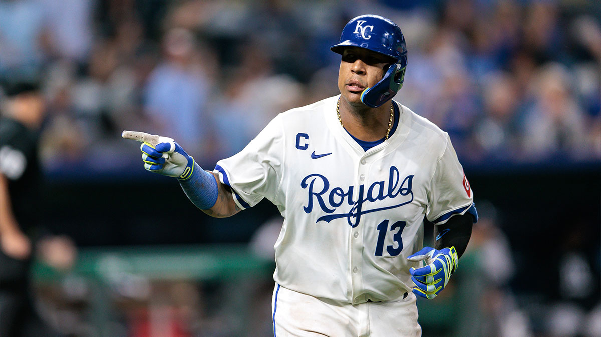 Kansas City Royals catcher Salvador Perez (13) motions to the dugout after hitting a home run during the ninth inning against the New York Yankees at Kauffman Stadium.