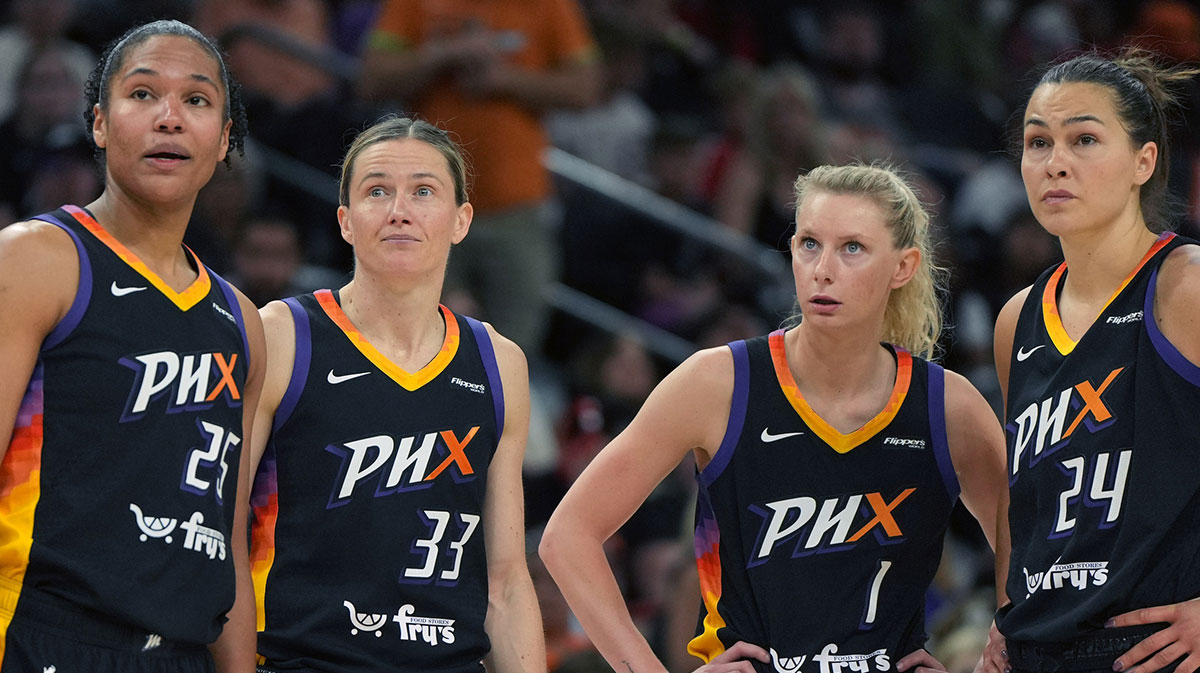 Phoenix Mercury forward Alyssa Thomas (25), guard Sami Whitcomb (33), guard Alexa Held (1), and forward Kathryn Westbeld (24) watch the replay against the Washington Mystics in the second half at Footprint Center.