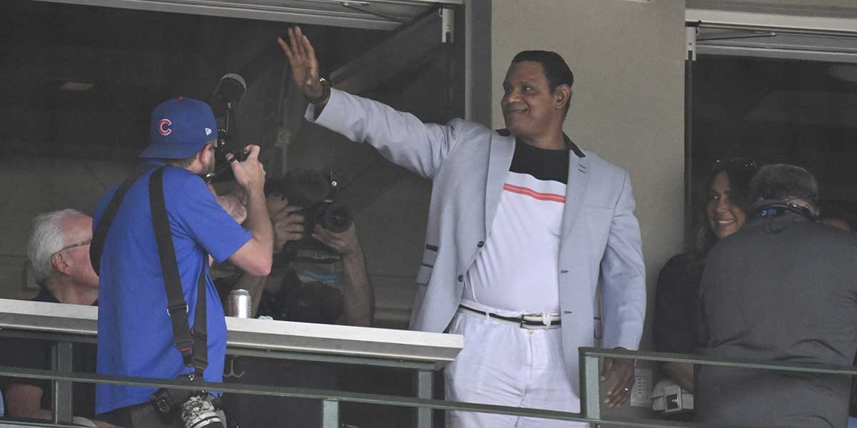 Jun 20, 2025; Chicago, Illinois, USA; Chicago Cubs former player Sammy Sosa greets fans during the game against the Seattle Mariners at Wrigley Field.