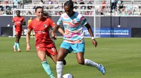 Kansas City Current midfielder Vanessa DiBernardo (16) challenges San Diego Wave FC defender Naomi Girma (4) for the ball during the second half at CPKC Stadium.