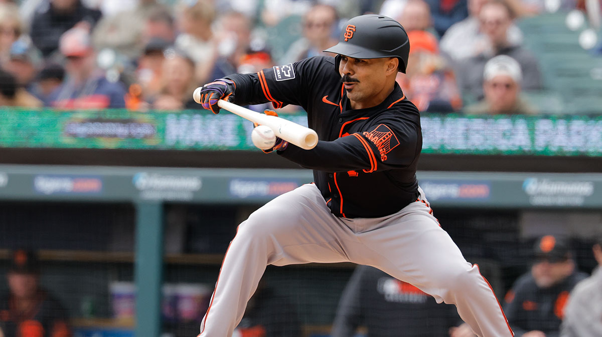 San Francisco Giants first base LaMonte Wade Jr. (31) bunts in the fourth inning against the Detroit Tigers at Comerica Park.