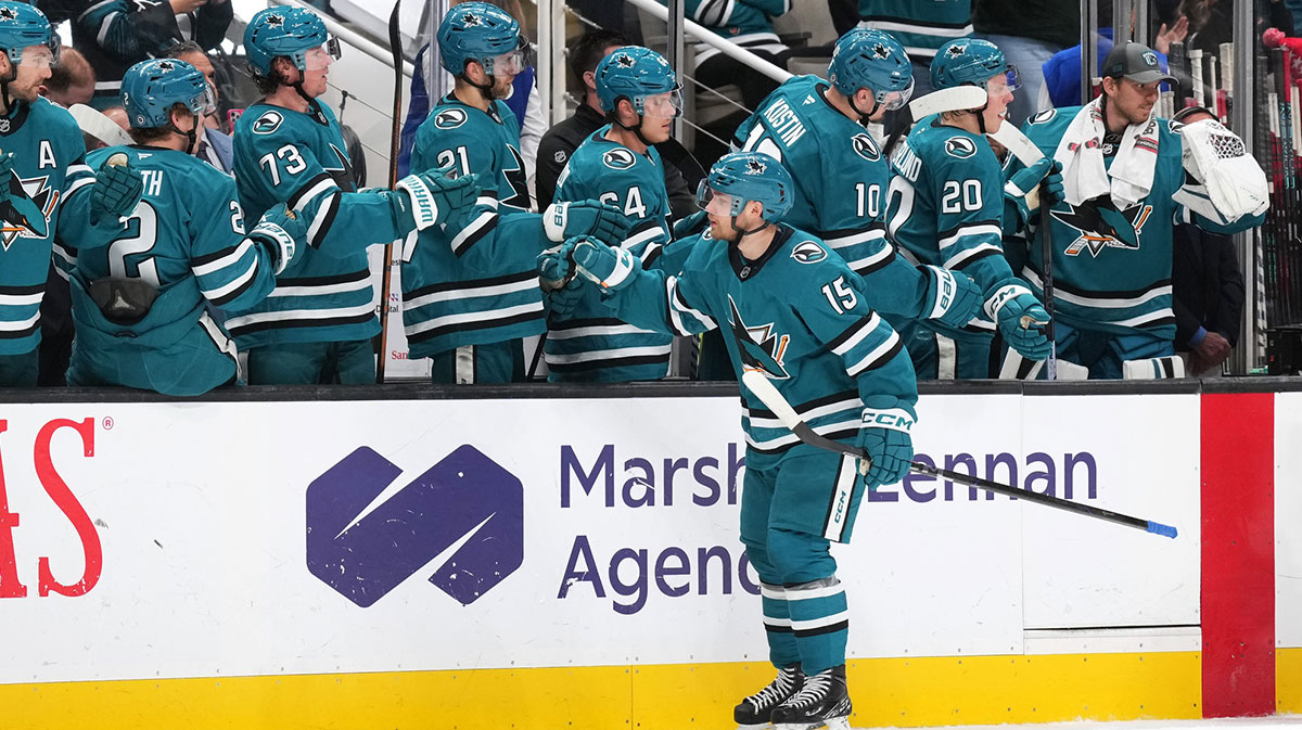 San Jose Sharks right wing Nikolai Kovalenko (15) celebrates with teammates after scoring a goal against the New Jersey Devils during the first period at SAP Center at San Jose.