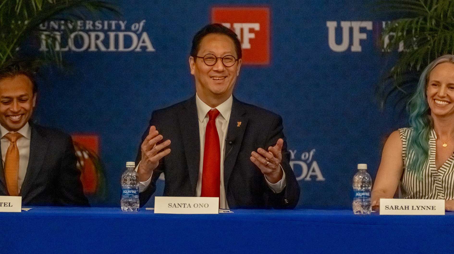 University of Florida faculty members listen to Dr. Santa Ono, center, the sole finalist for the university's president, along with Rahul Patel, left, and Sarah Lynne during a forum on May 6, 2025, at Emerson Alumni Hall in Gainesville.