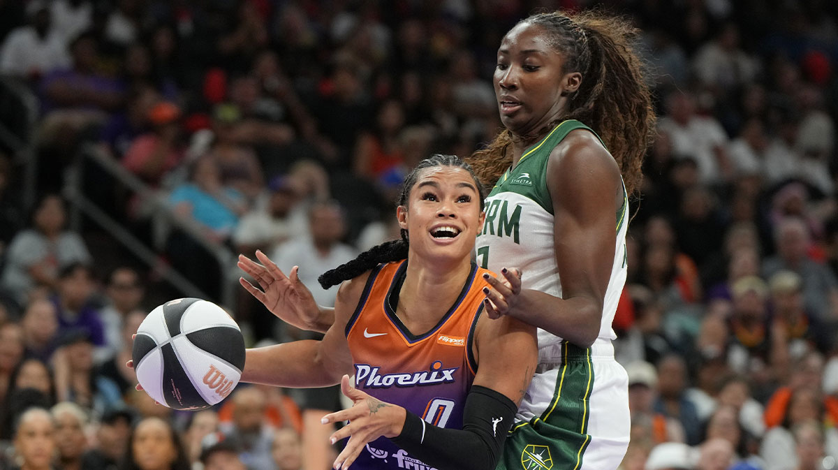 Phoenix Mercury forward Satou Sabally (0) drives on Seattle Storm forward Ezi Magbegor (13) in the second half at Footprint Center.