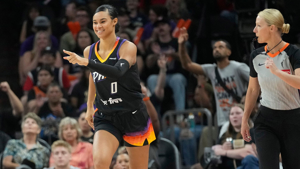 Phoenix Mercury forward Satou Sabally (0) points after a three point basket against the Dallas Wings during the fourth quarter in Phoenix, at PHX Arena on Jun 11, 2025.
