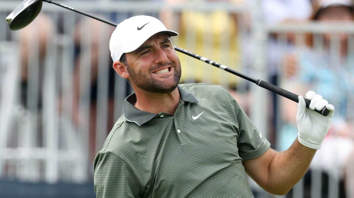 Scottie Scheffler watches after his shot from the third tee during the second round of the U.S. Open golf tournament.