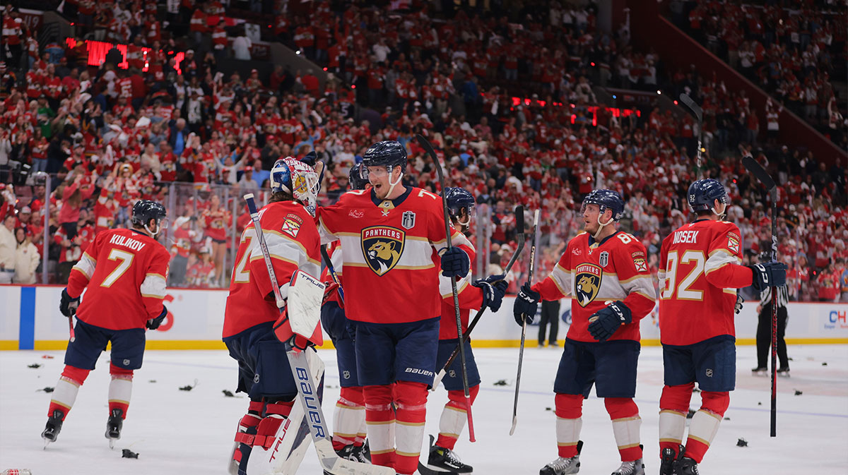 Florida Panthers defenseman Niko Mikkola (77) celebrates with goaltender Sergei Bobrovsky (72) after the third period in game three of the 2025 Stanley Cup Final at Amerant Bank Arena.