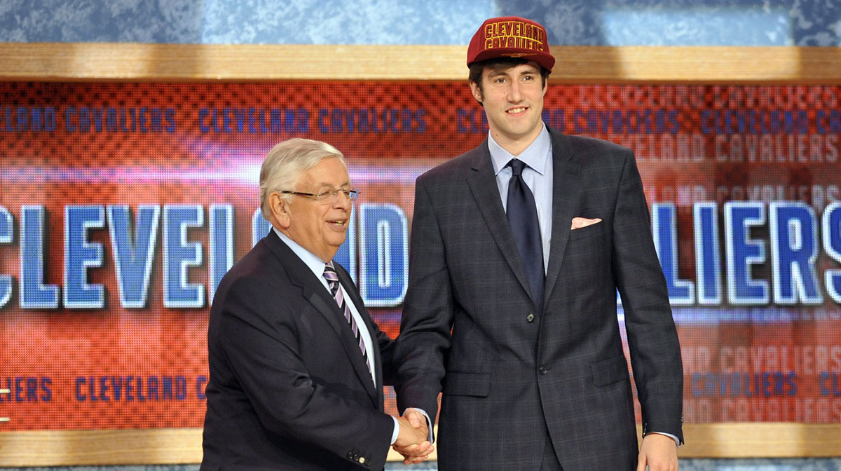 Sergey Karasev poses with NBA commissioner David Stern after being selected as the number nineteen overall pick to the Cleveland Cavaliers during the 2013 NBA Draft at the Barclays Center.
