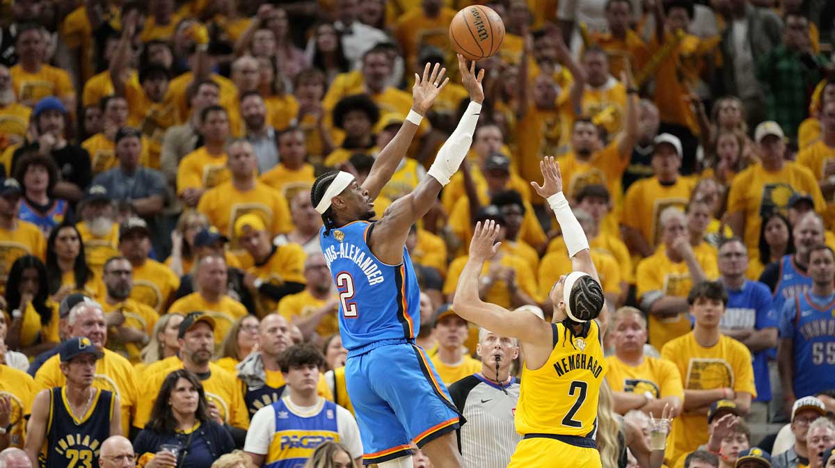 Oklahoma City Thunder guard Shai Gilgeous-Alexander (2) shoots the ball against Indiana Pacers guard Andrew Nembhard (2) during the second half during game four of the 2025 NBA Finals at Gainbridge Fieldhouse.