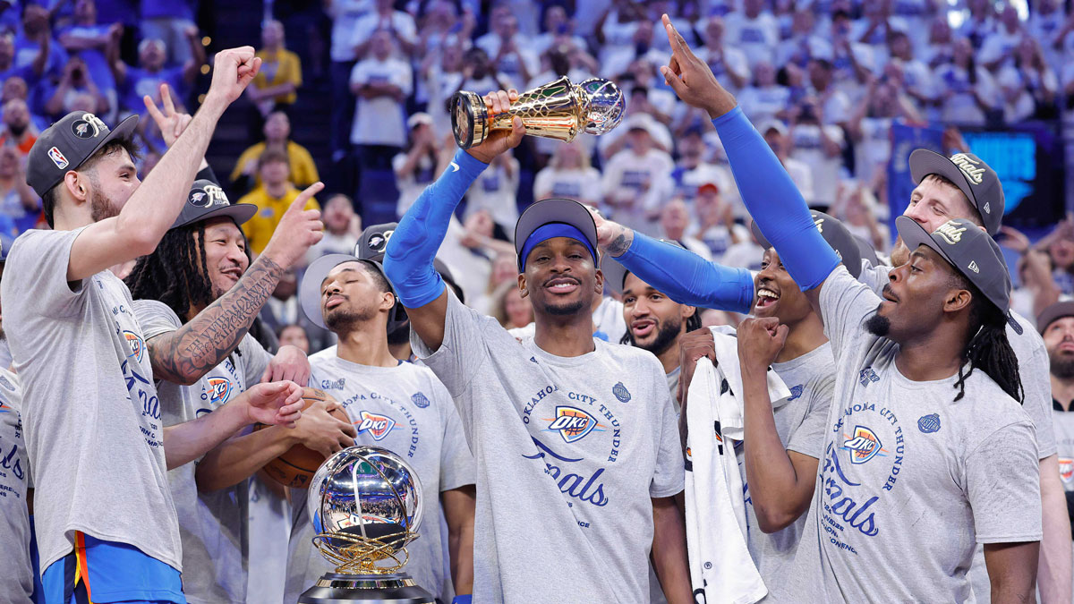 Oklahoma City Thunder guard Shai Gilgeous-Alexander holds up the MVP trophy for the western conference finals for the 2025 NBA Playoffs at Paycom Center.