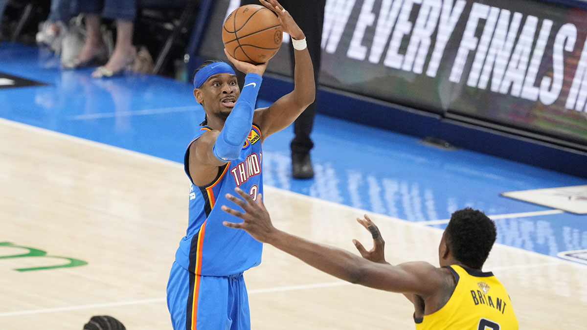 Oklahoma City Thunder guard Shai Gilgeous-Alexander (2) shoots the ball against Indiana Pacers center Thomas Bryant (3) during the second half during game two of the 2025 NBA Finals at Paycom Center.