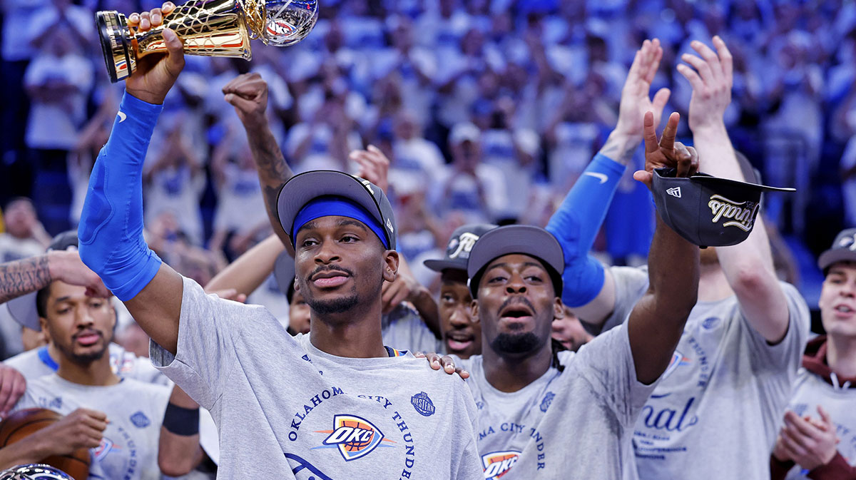 Oklahoma City Thunder guard Shai Gilgeous-Alexander (2) celebrates with Magic Johnson West Conference Finals MVP trophy after defeating the Minnesota Timberwolves in game five to win the western conference finals for the 2025 NBA Playoffs at Paycom Center.