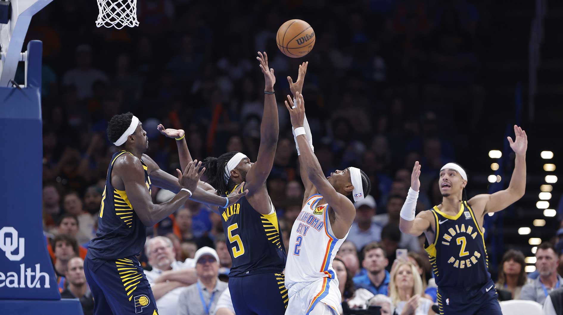 Oklahoma City Thunder guard Shai Gilgeous-Alexander (2) shoots as Indiana Pacers forward Jarace Walker (5) defends during the second half at Paycom Center.