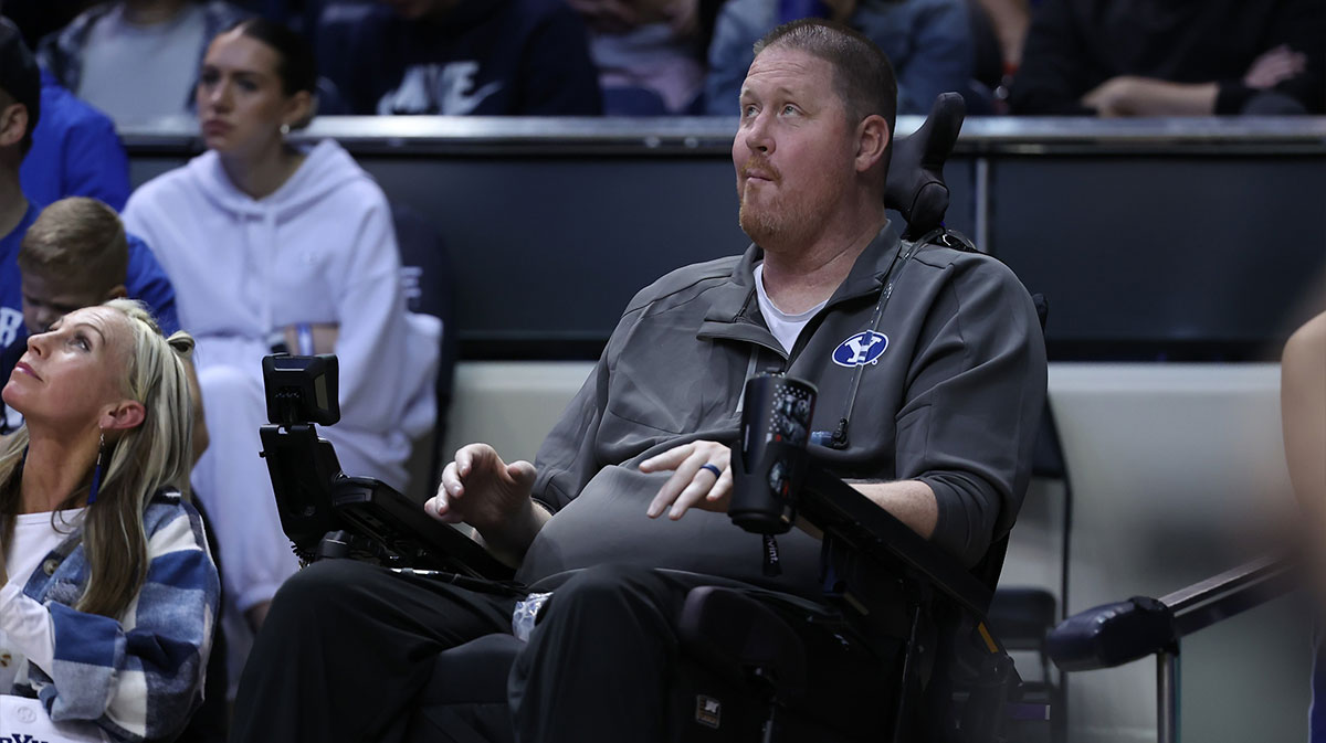 NBA former player and Brigham Young Cougars alumni Shawn Bradley watches a game between the Brigham Young Cougars and the Texas Longhorns during the second half at Marriott Center. Bradley was the number two pick in the 1993 NBA draft. Bradley was paralyzed from the chest down in a bicycle accident in 2021.