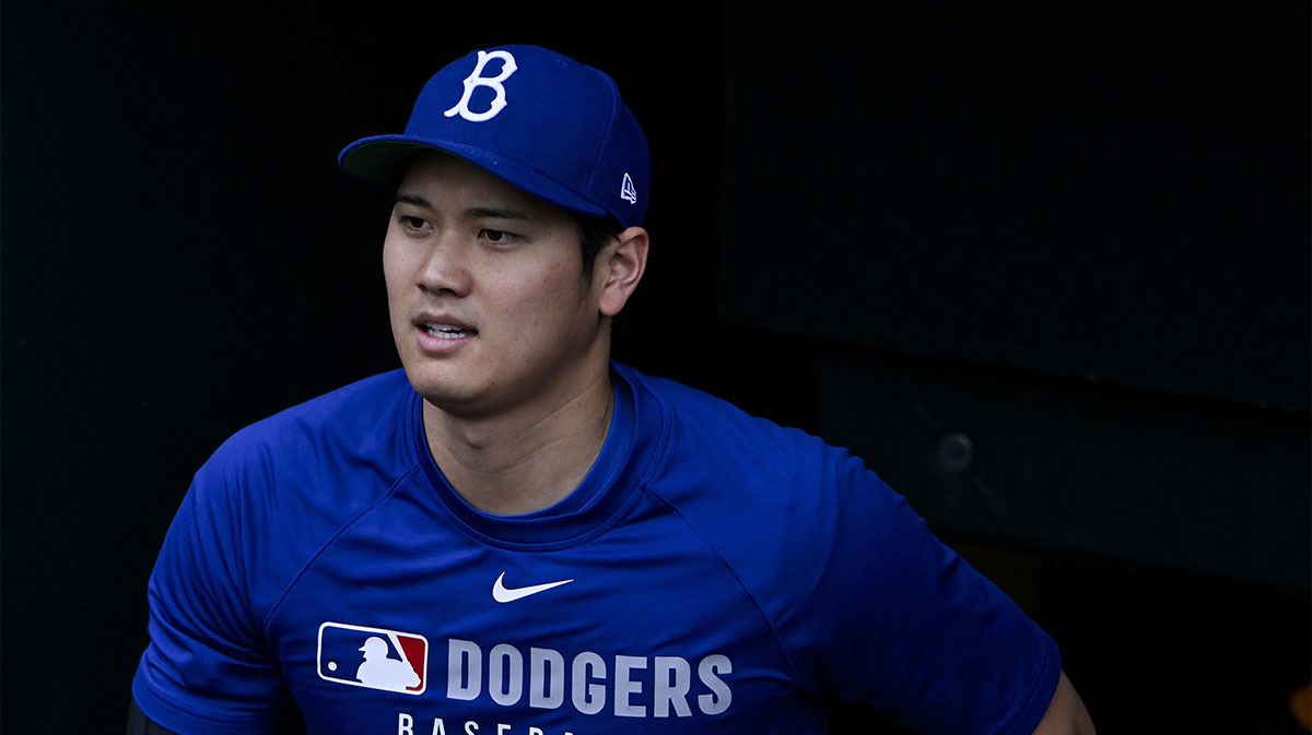 Los Angeles Dodgers designated hitter Shohei Ohtani (17) walks on to the field before a game against the St. Louis Cardinals at Busch Stadium.