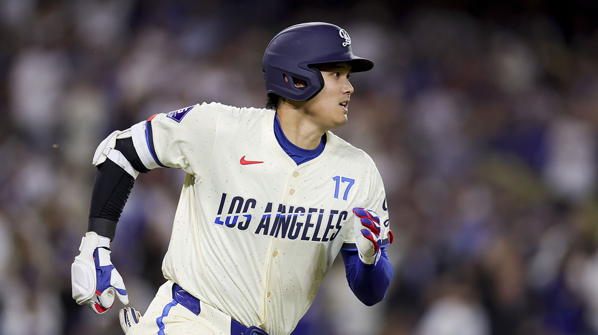 Los Angeles Dodgers designated hitter Shohei Ohtani runs after hitting a solo home-run during the sixth inning of a baseball game against the San Francisco Giants at Dodger Stadium.